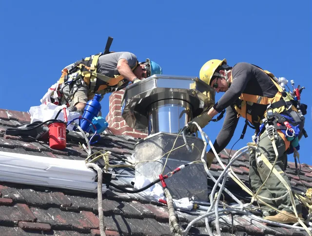 Protective chimney cap installed by East Cleveland Chimney Sweep in East Cleveland, OH