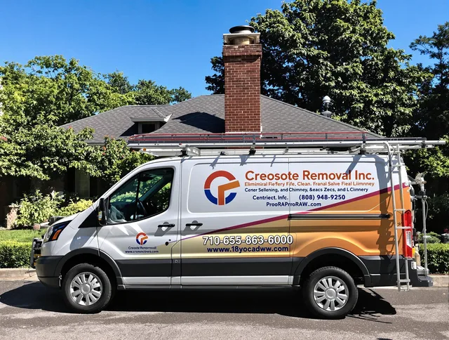 East Cleveland Chimney Sweep technician removing creosote safely in East Cleveland, OH